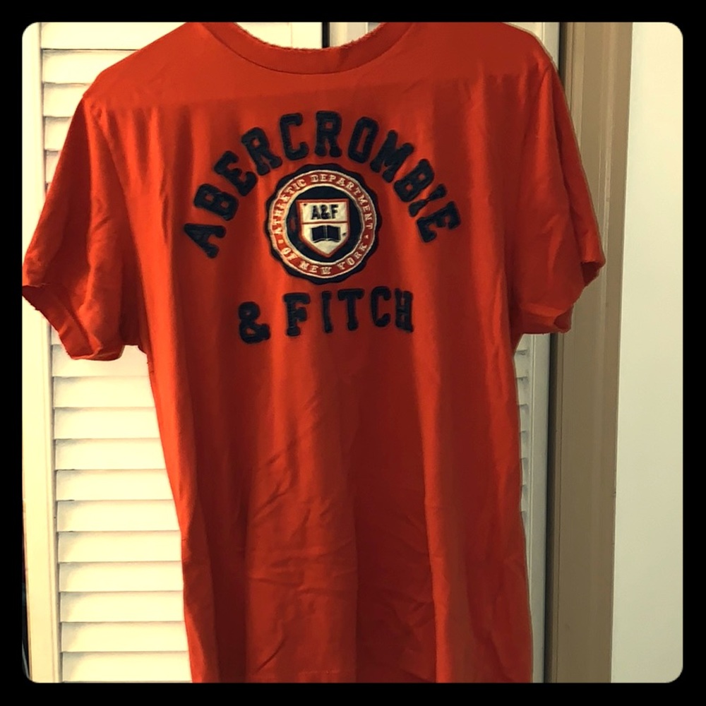 Orange Abercrombie and Fitch tee.